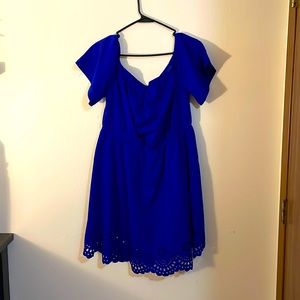 Blue knee length dress.